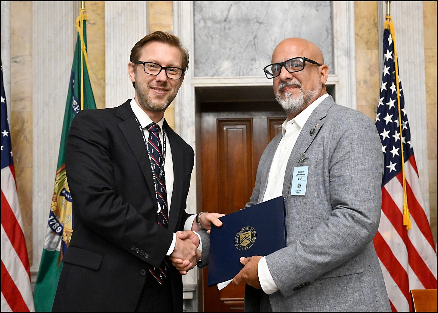 Tony Arcadi at an award presentation during his Treasury retirement ceremony